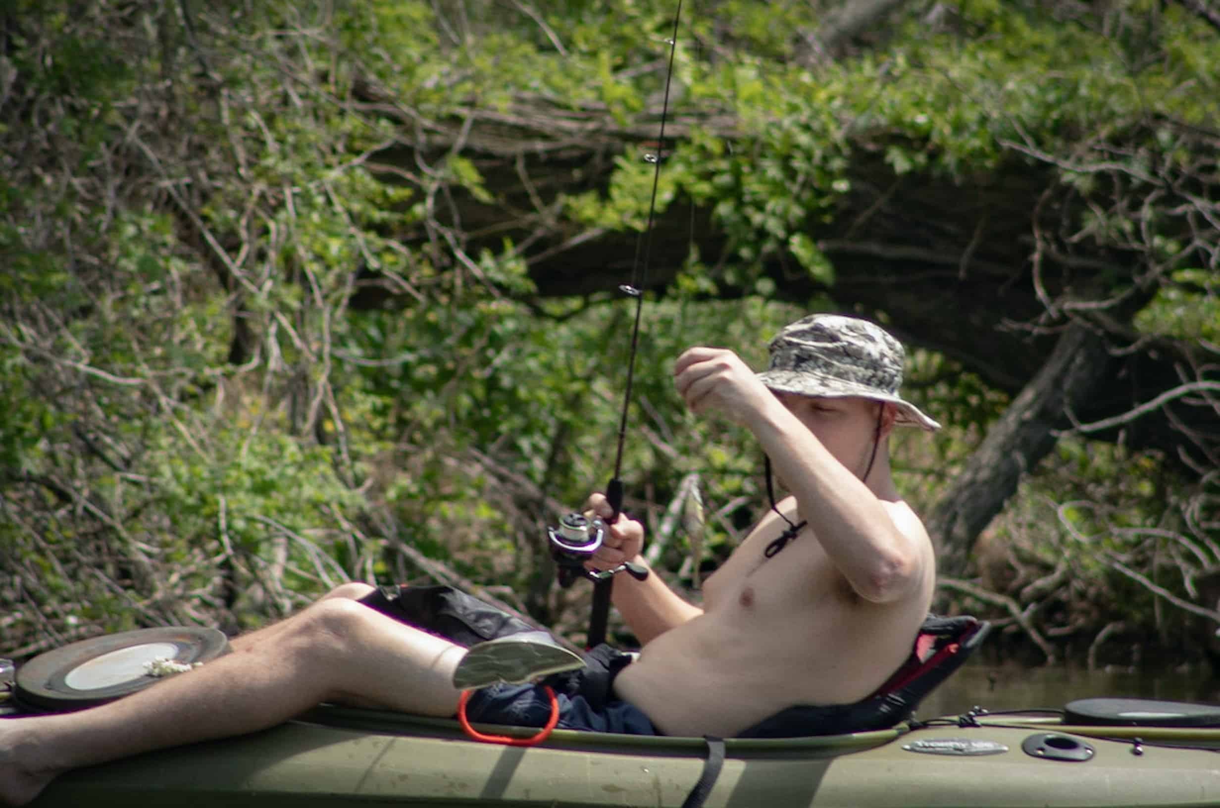 Man fishing in a canoe